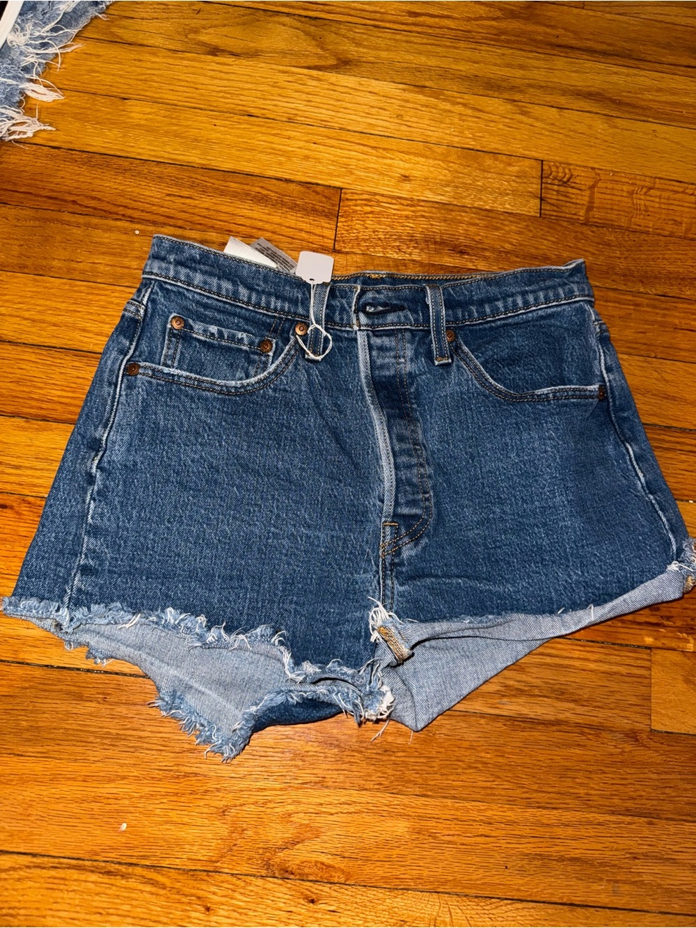 Levi's Distressed Dark Blue Denim Cutoff Shorts